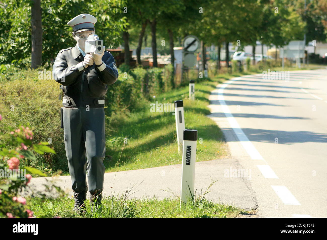 gendarme dummy with laser gun Stock Photo