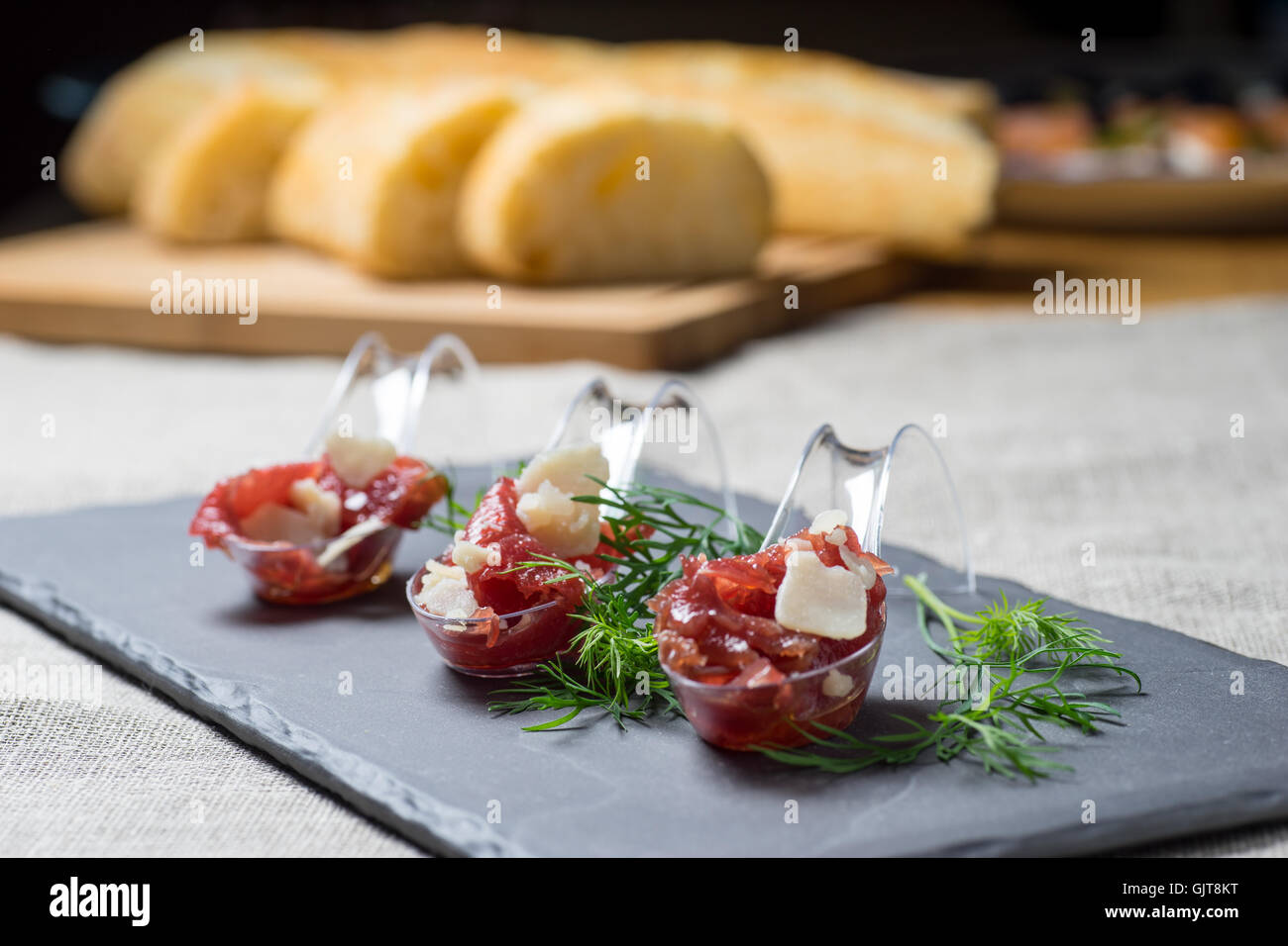 Appetizer with meat, Carpaccio and parmesan served on a Spoon Stock Photo