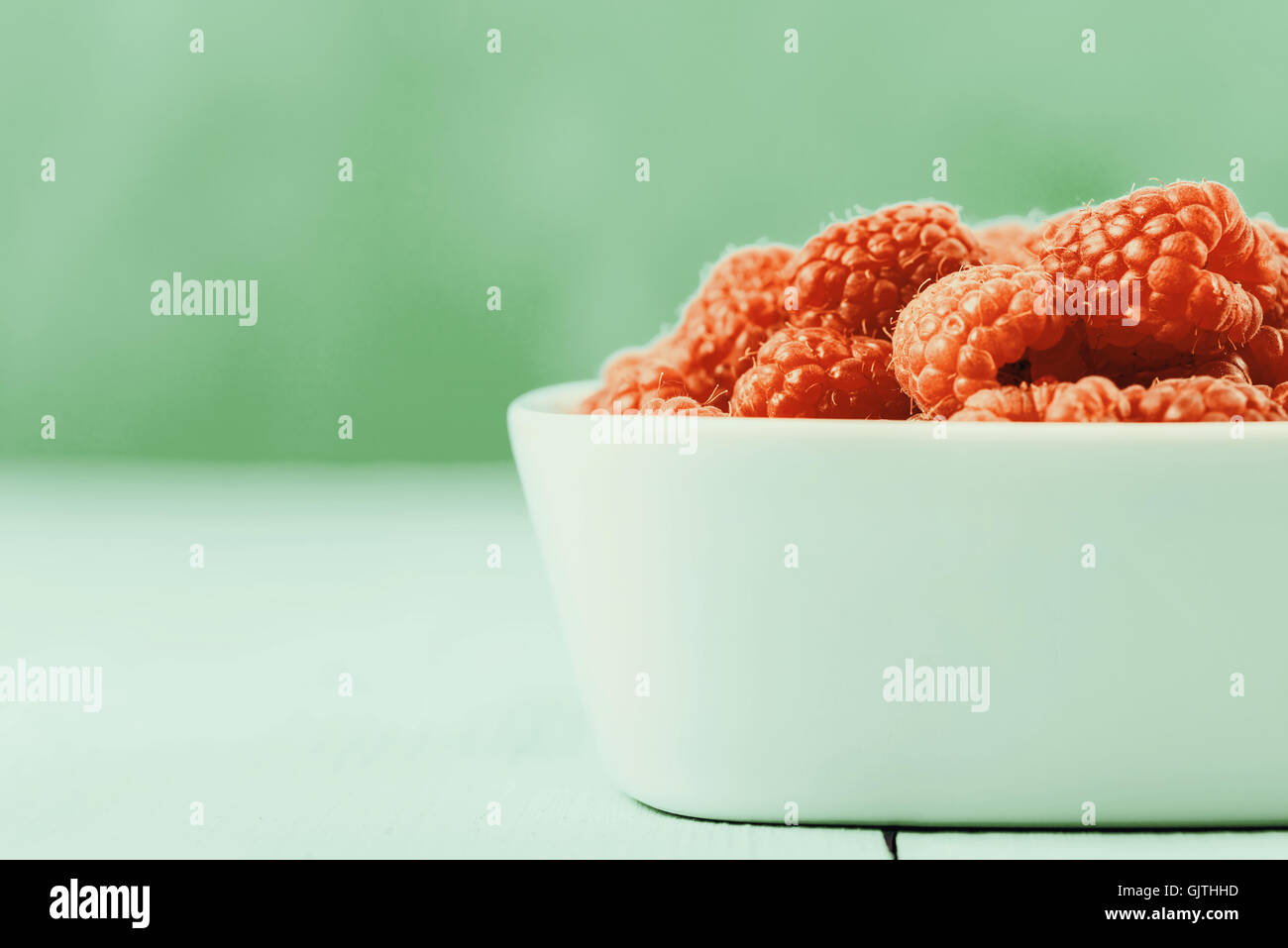 Bowl Of Fresh Raspberries Stock Photo