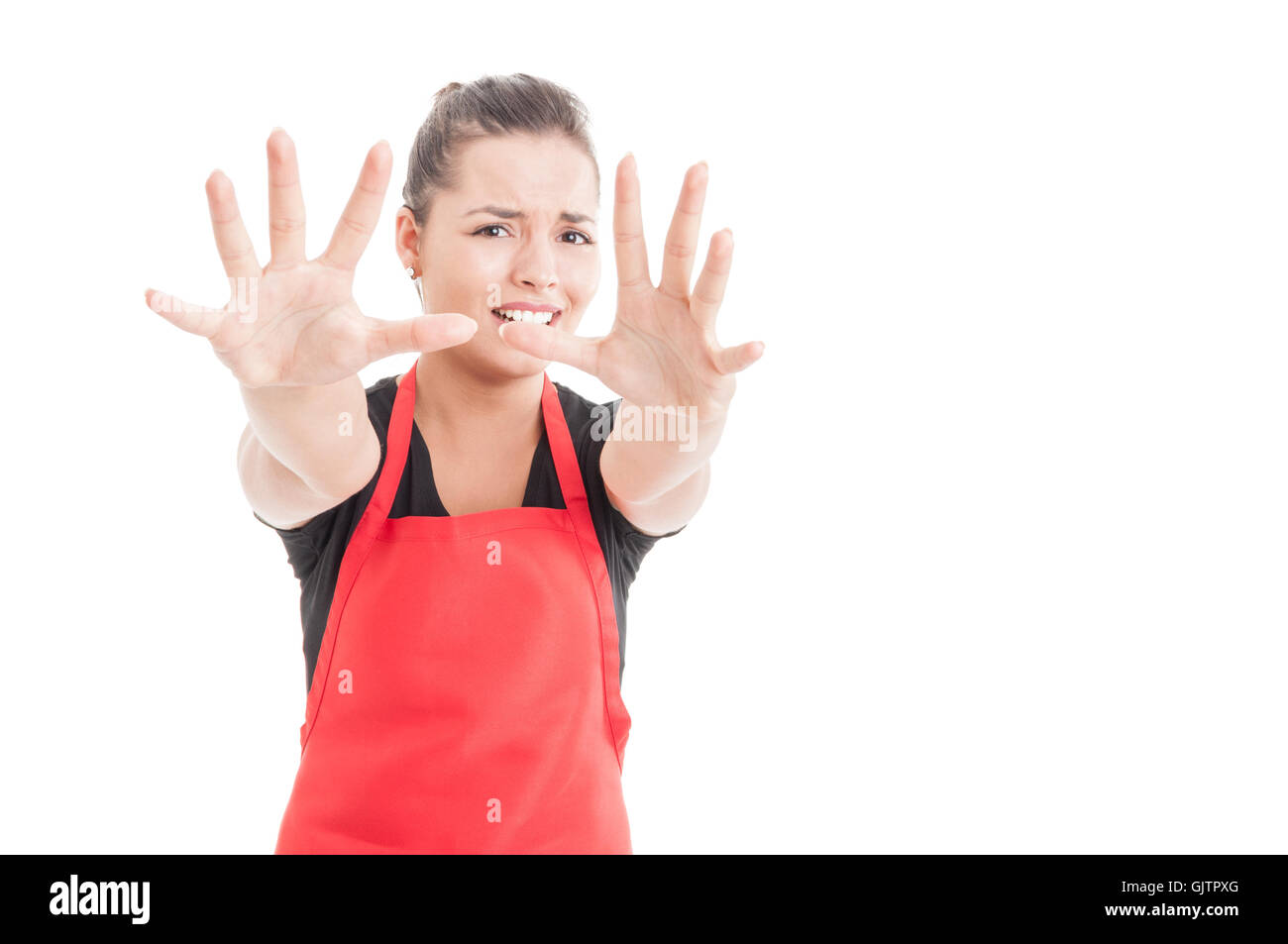 Young market seller looking stressed and asking for help on white background with text area Stock Photo
