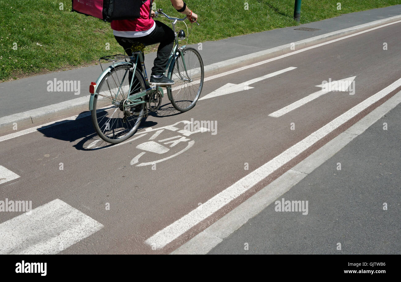 cyclist on bike lane Stock Photo