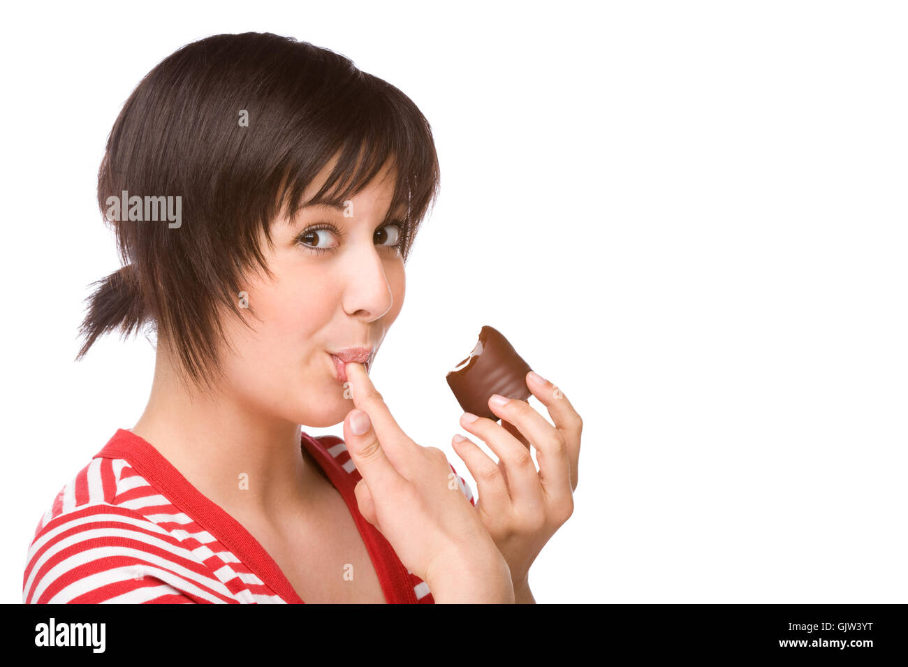 young woman with a mohrenkopf Stock Photo
