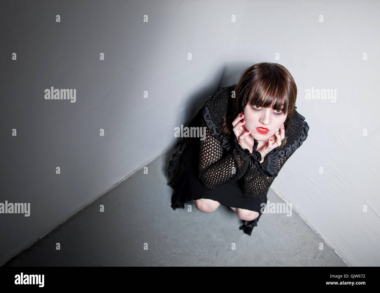 woman female corner Stock Photo - Alamy