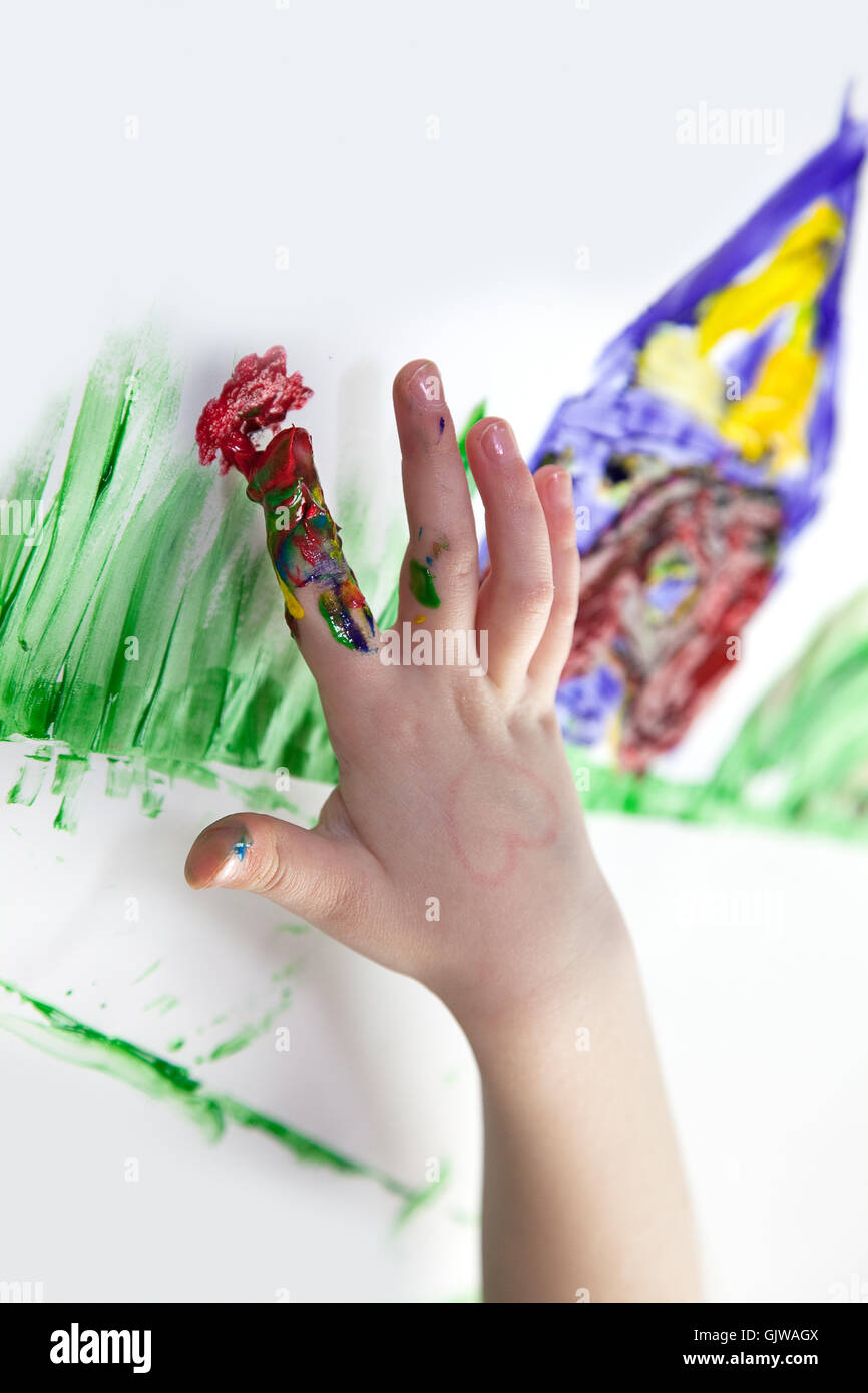 toddler in finger painting Stock Photo Alamy