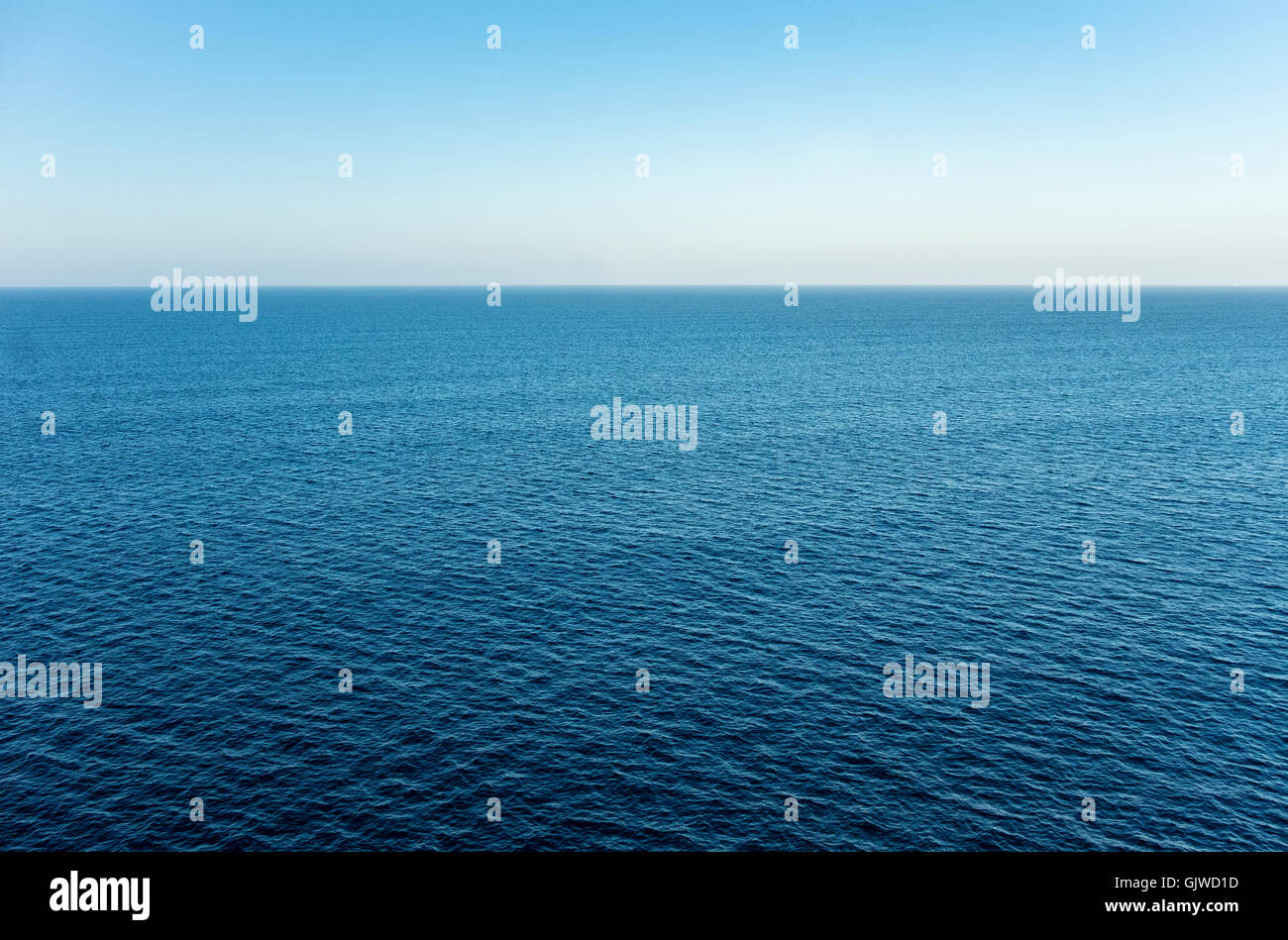 High view over an ocean horizon on a clear day Stock Photo