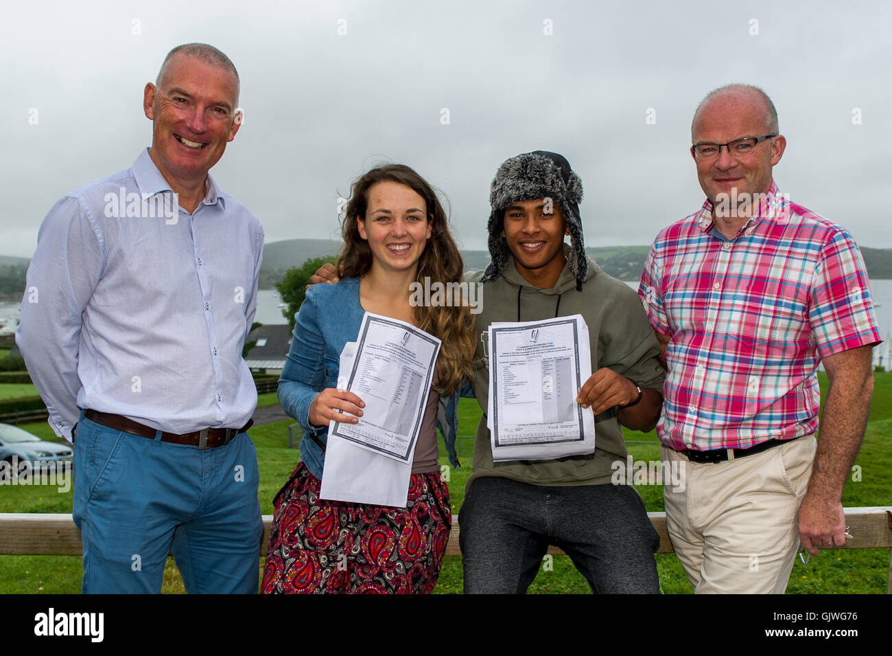 Schull, Ireland. 17th Aug, 2016. Padraig O'Sullivan, Deputy Principal and Brendan Drinan, Principal pose with the two top students from this years Leaving Cert at Schull Community College. Students Fionnuala Solomon from Ballydehob achieved 590 points whilst Cian Reeves from Schull managed a massive 610 points. Credit: Andy Gibson/Alamy Live News Stock Photo