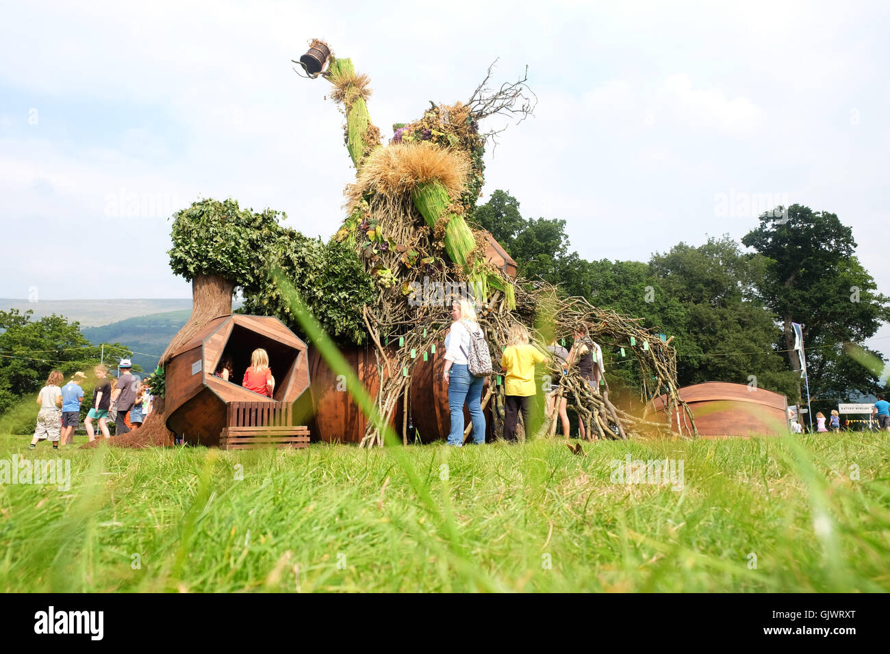Green Man Festival, Wales, UK - August 2016. The Green Man of the Green Man Festival a sculpture made of wood and branches is the centre point of the Festival. The four day music and arts festival set beside the Brecon Beacons. Stock Photo