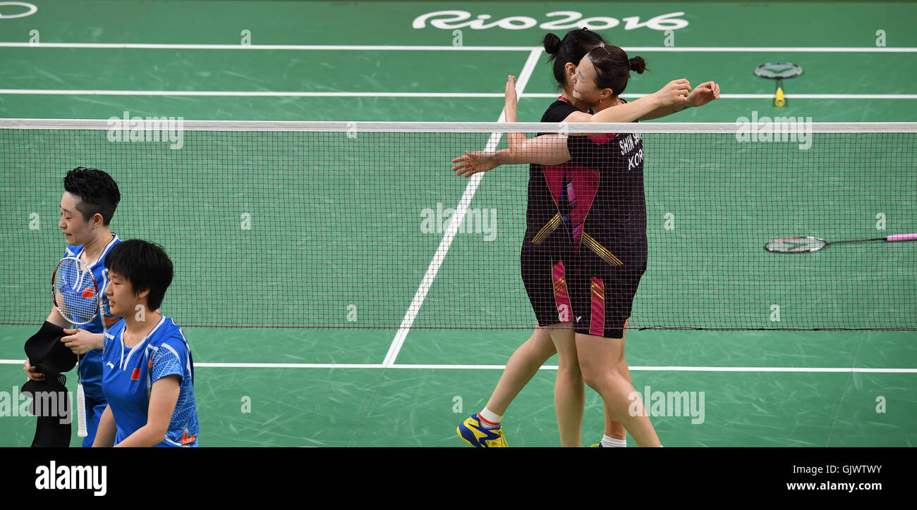 Rio De Janeiro, Brazil. 18th Aug, 2016. South Korea's Jung Kyung Eun and Shin Seung Chan celebrate after the women's doubles badminton bronze medal match between China's Tang Yuanting and Yu Yang and South Korea's Jung Kyung Eun and Shin Seung Chan at the 2016 Rio Olympic Games in Rio de Janeiro, Brazil, on Aug. 18, 2016. Tang Yuanting and Yu Yang lost the match with 0:2. Credit:  Lui Siu Wai/Xinhua/Alamy Live News Stock Photo