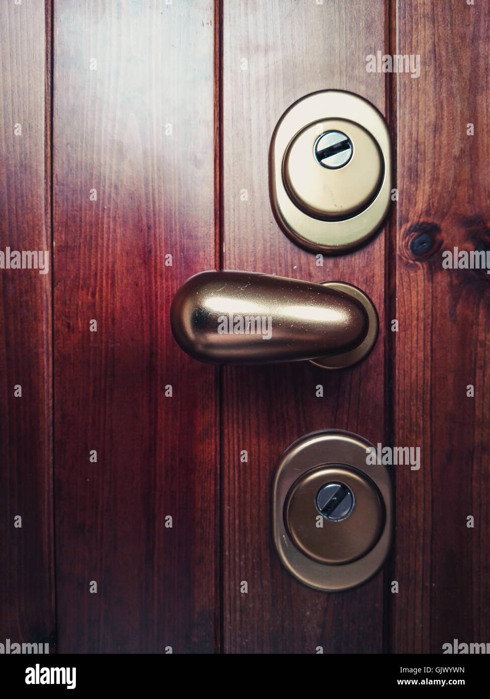 Lock on a wooden door Stock Photo - Alamy