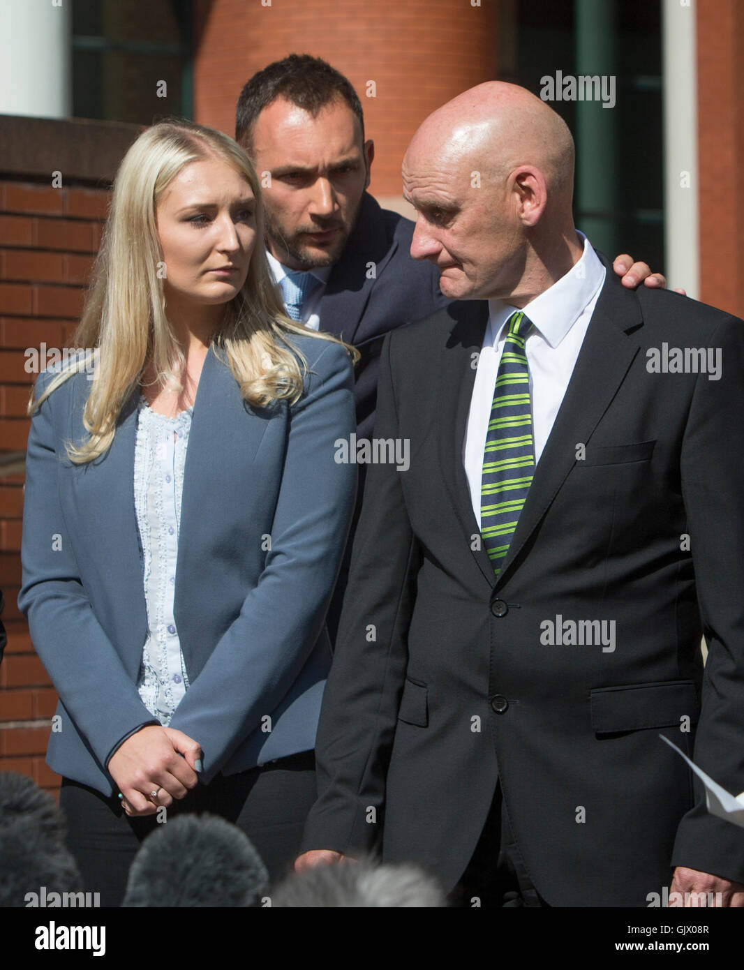 Ian Johnston (right) partner of murder victim Sadie Hartley, with his daughter Hannah, outside Preston Crown Court, after his 'bunny boiler' ex was jailed for life and ordered to serve a minimum of 30 years in jail for the gruesome stun gun murder of her love rival. Stock Photo