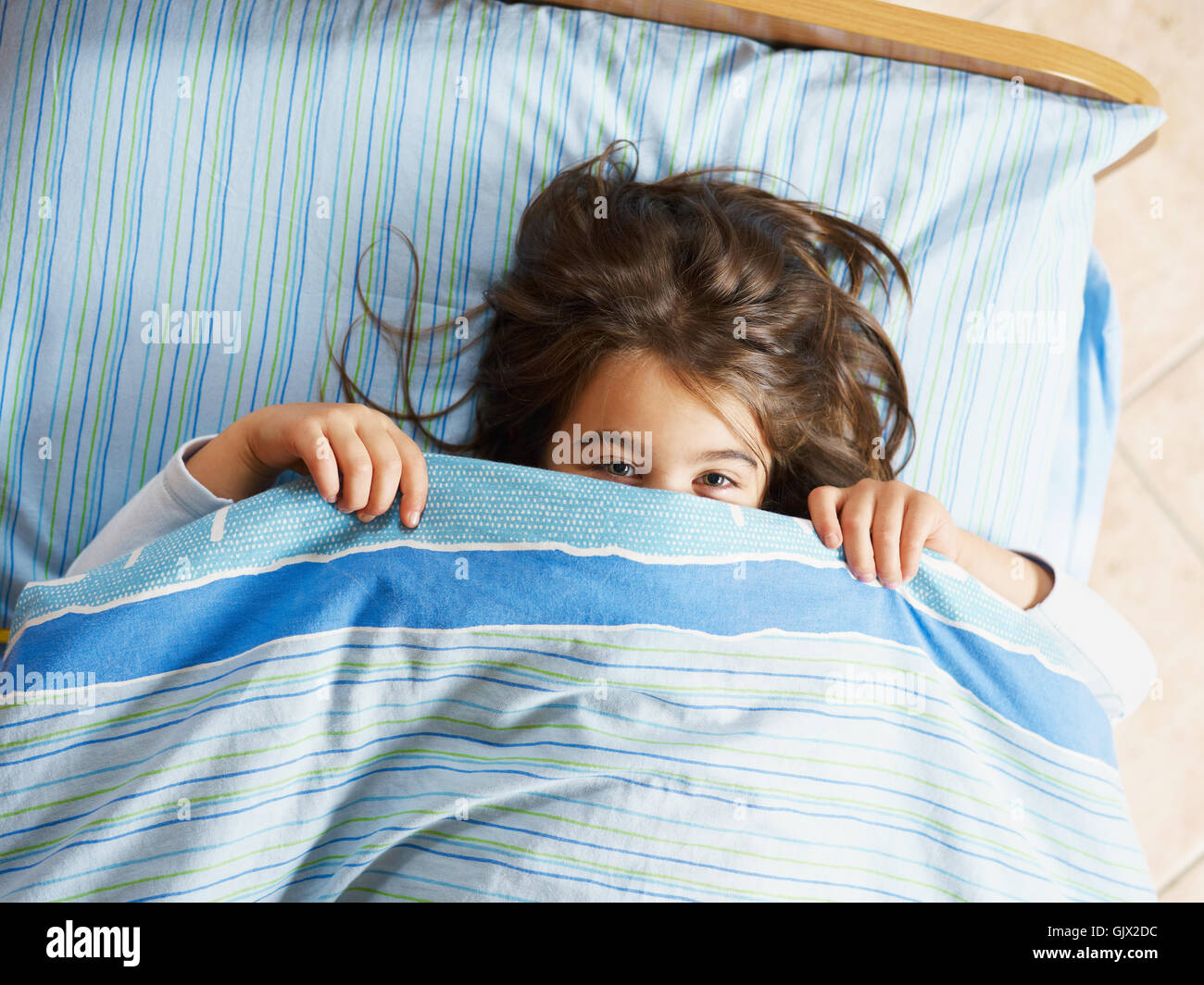 Girls hiding under bed sheet hires stock photography and images Alamy