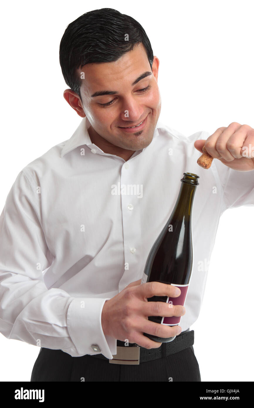 Removing cork from wine Stock Photo Alamy
