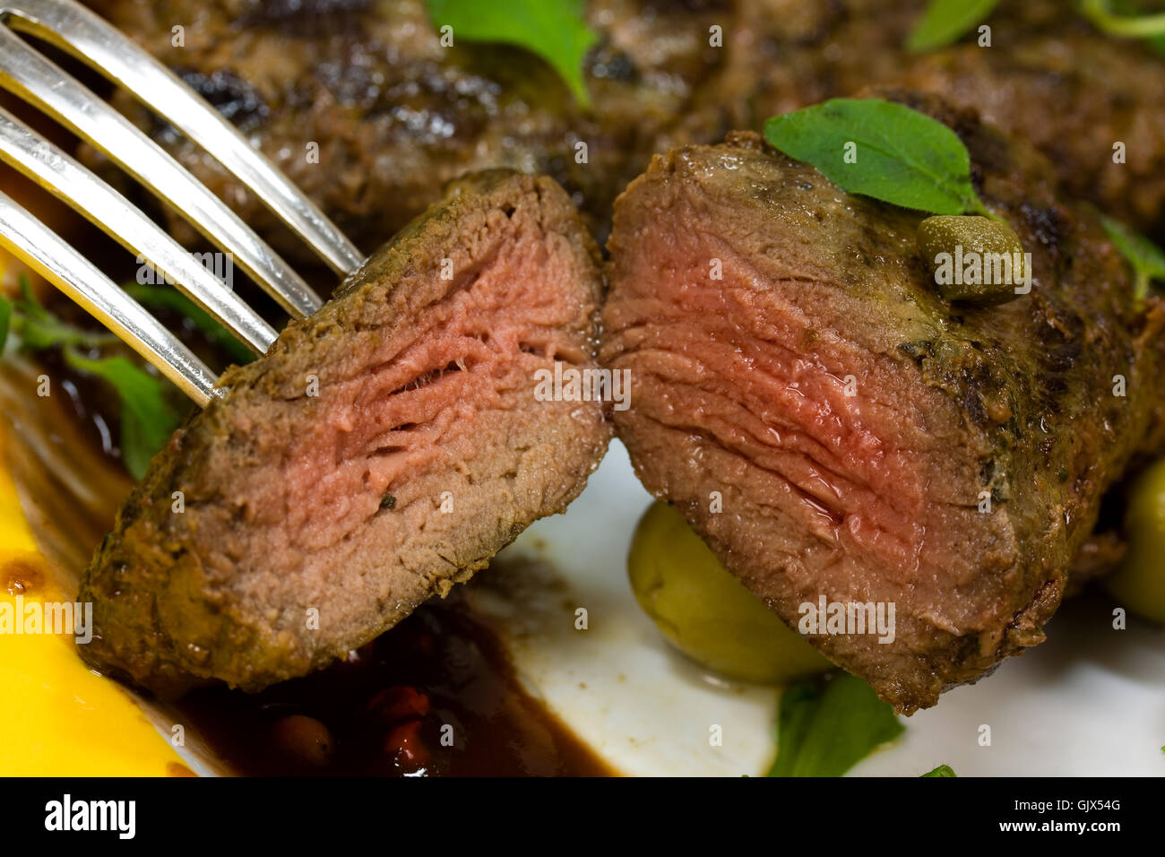 lamb medallions steak with arugula,sauce Stock Photo Alamy