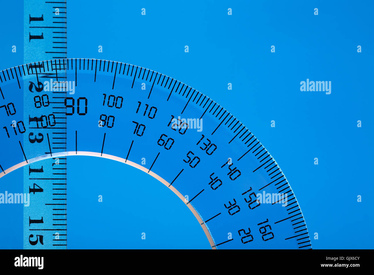 Rulers On Blue Stock Photo - Alamy