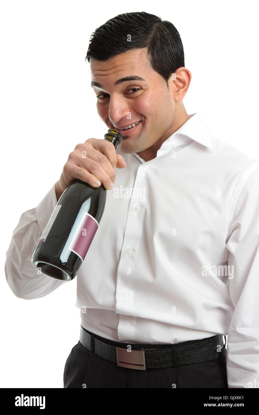 Alcohol abuse man drinking from wine bottle Stock Photo