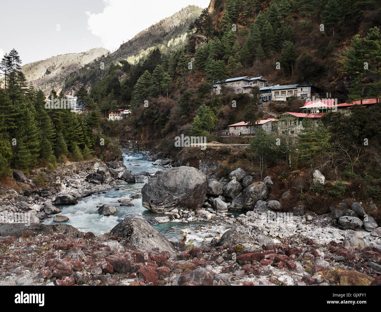 A view of the mountain village of Phakding, located in Nepal's Everest Base Camp. Stock Photo