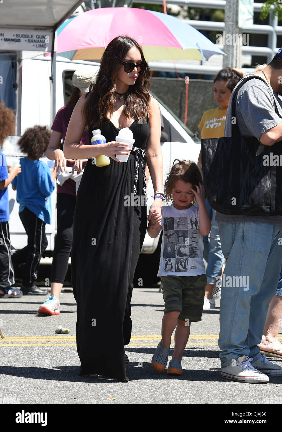 Megan Fox and Brian Austin Green take their sons to the Farmers Market Featuring: Megan Fox, Noah Shannon Green Where: Los Angeles, California, United States When: 17 Apr 2016 Stock Photo