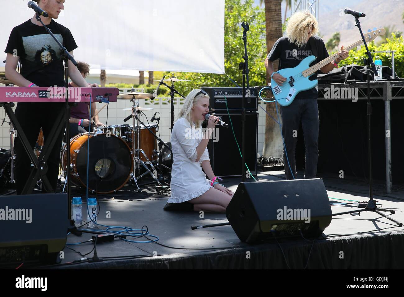 Grace McKagan and her band The Pink Slips perform on stage at the party