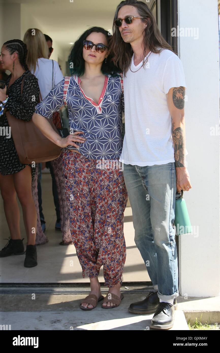 Brandon Boyd seen posing next to his artwork at the Paradise House Interview magazine party  Featuring: Brandon Boyd Where: Los Angeles, California, United States When: 18 Apr 2016 Stock Photo