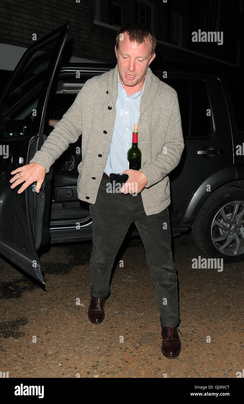 Guy Ritchie Cottage Guy Ritchie seen arriving at Madonnas London home with a bottle of wine ...