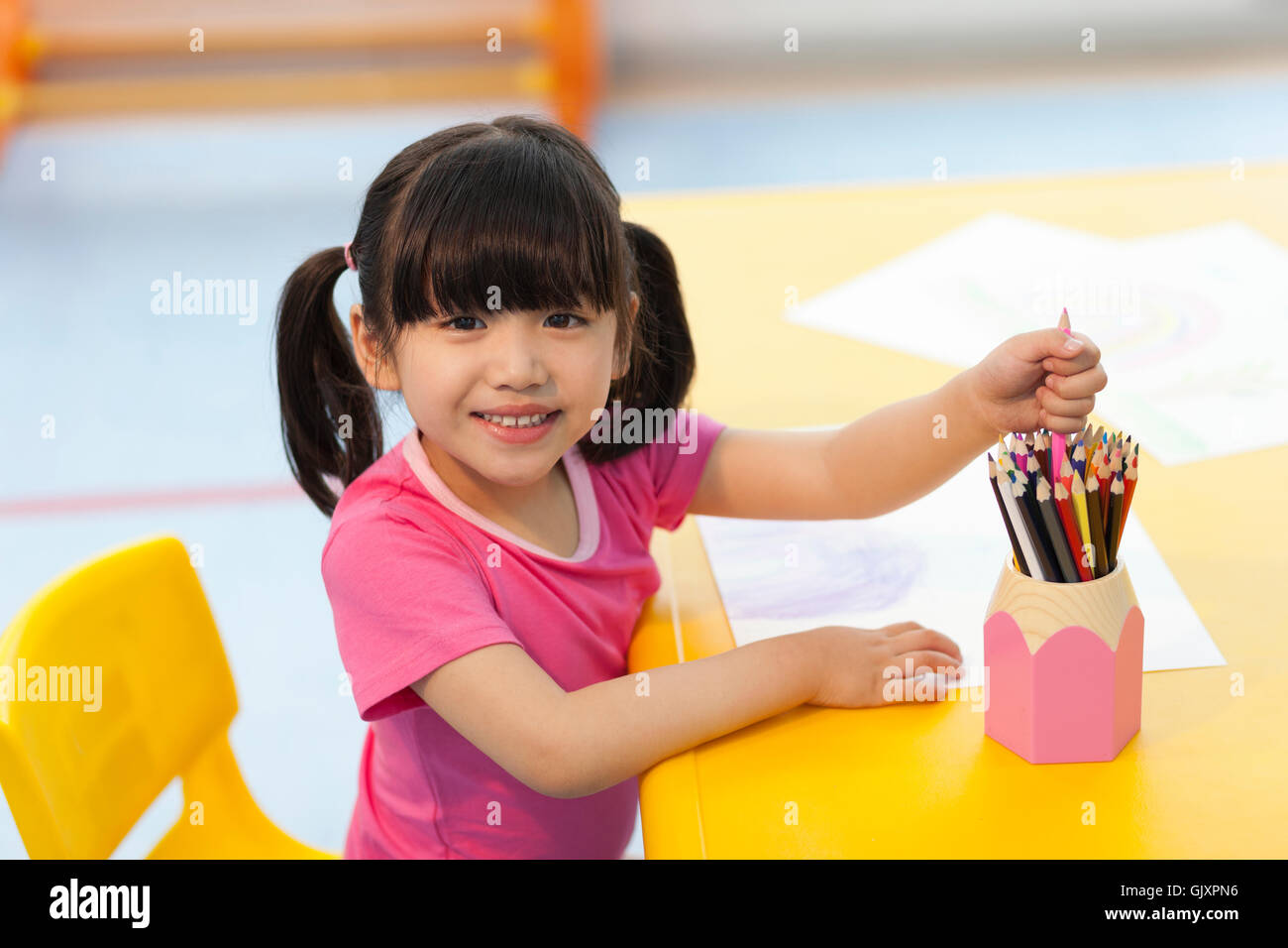 The little girl writing Stock Photo Alamy