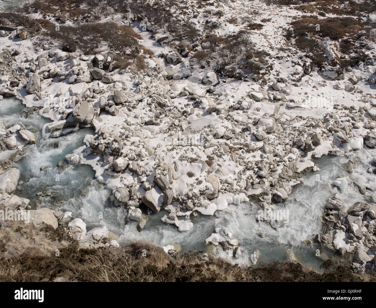 Cold, rushing mountain water in Nepal's Everest Base Camp Stock Photo