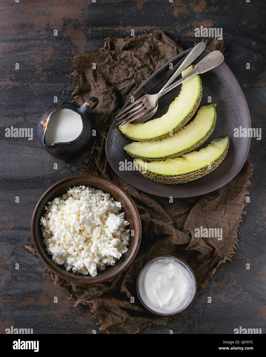 Ceramic Bowl Of Homemade Cottage Cheese With Yogurt Jug Of Milk