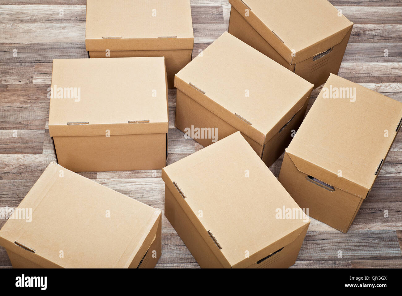Many moving boxes on the floor Stock Photo