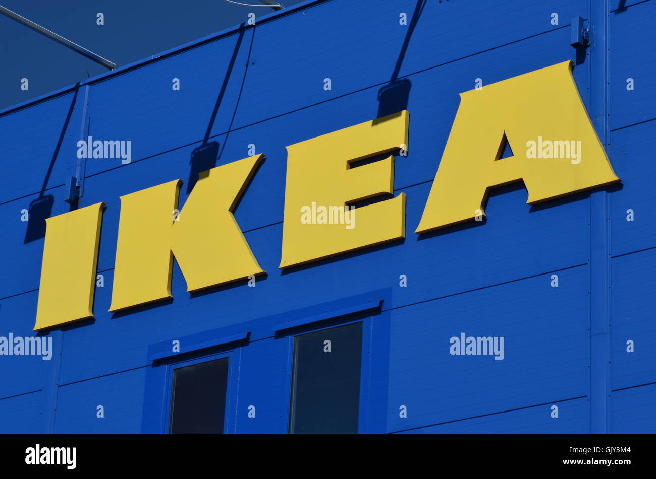 Ikea Logo Sign Against Blue Sky Ikea Brand Yellow And Blue Colors Colours Yellow Logo On Blue Wall Opposite Colors Colours Stock Photo Alamy