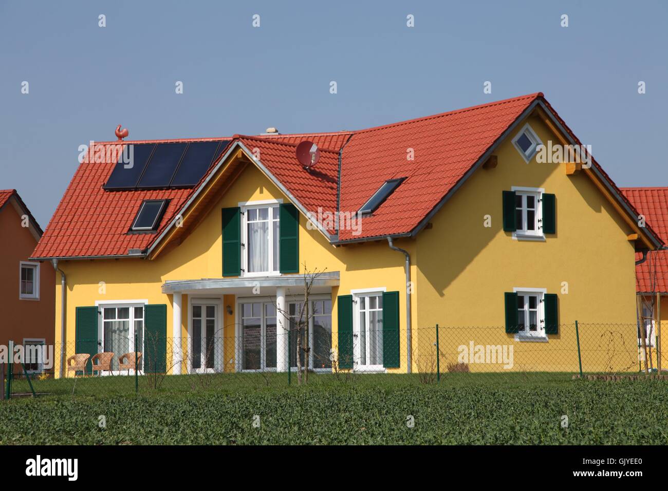 yellow new detached house Stock Photo