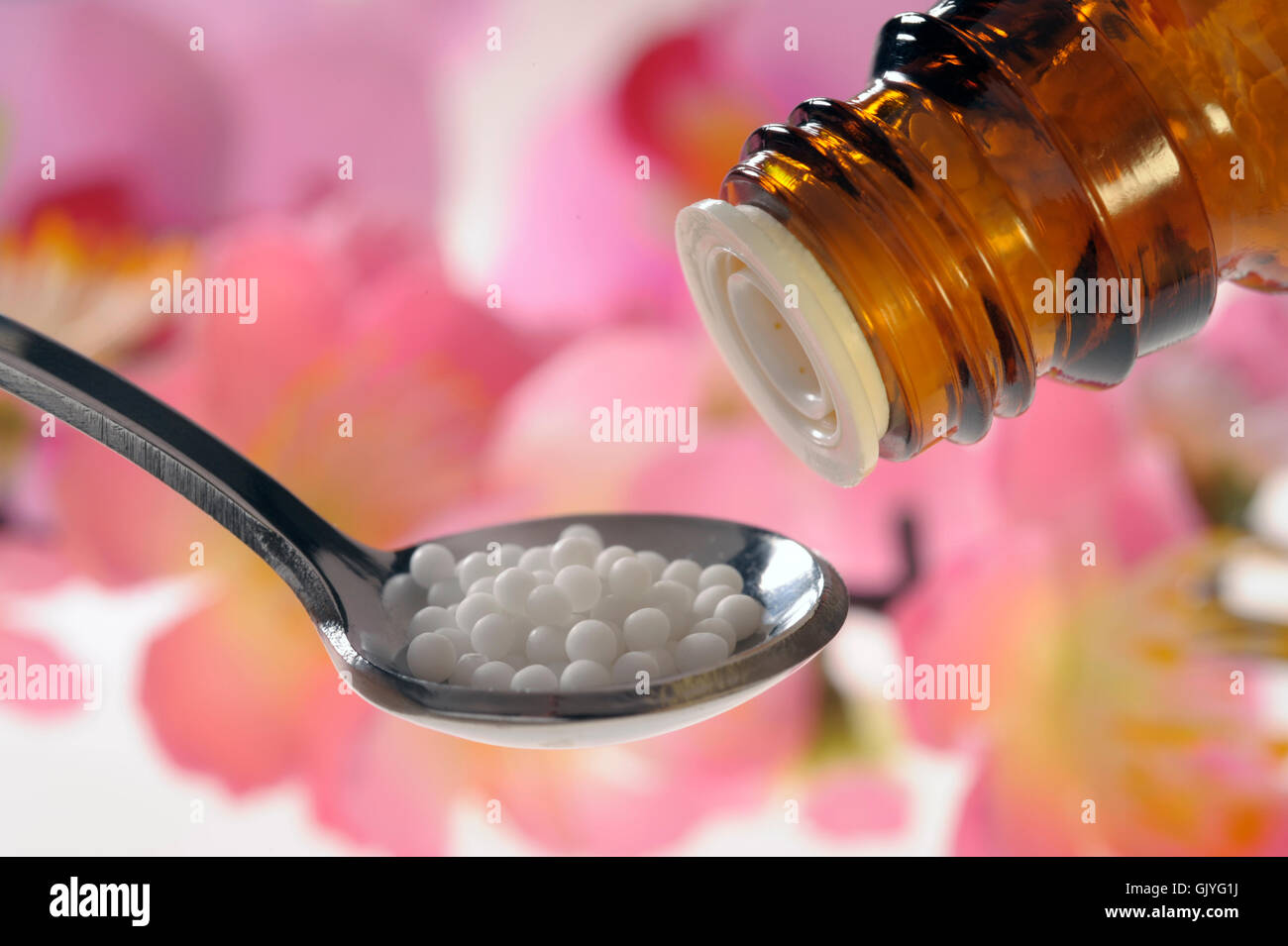 natural medicine with globules Stock Photo
