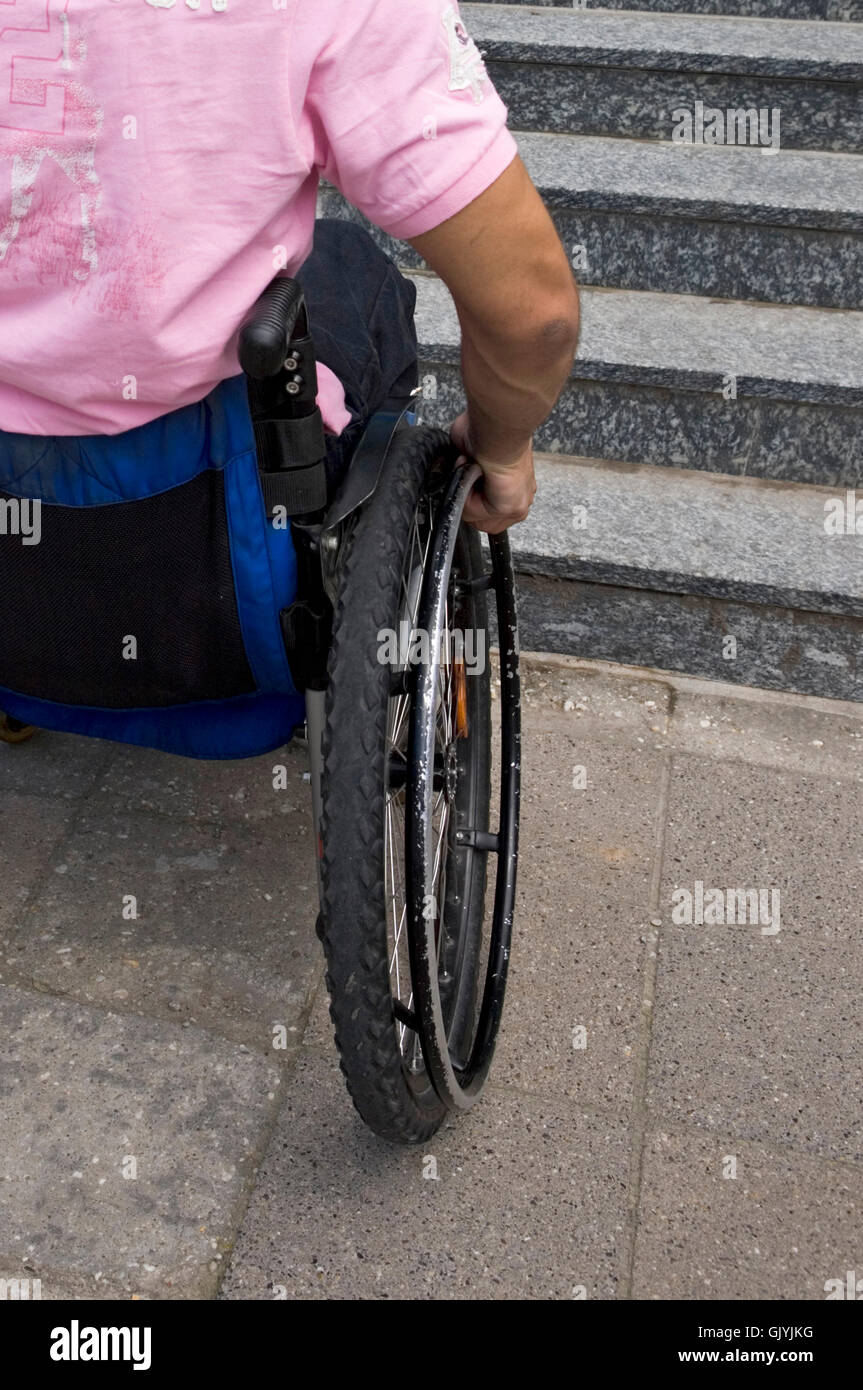 wheelchair stairs wheelchair user Stock Photo
