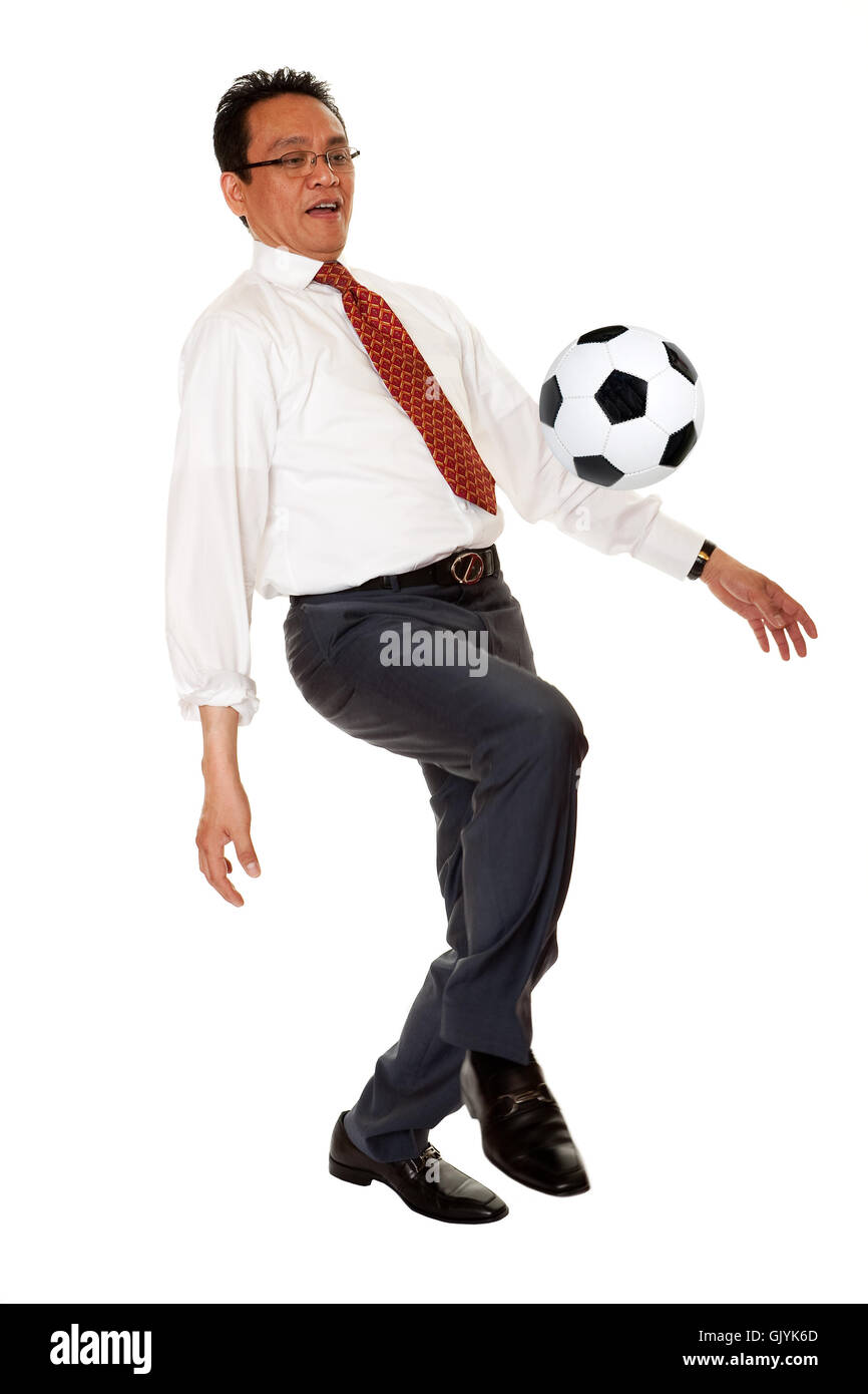 manager plays football Stock Photo