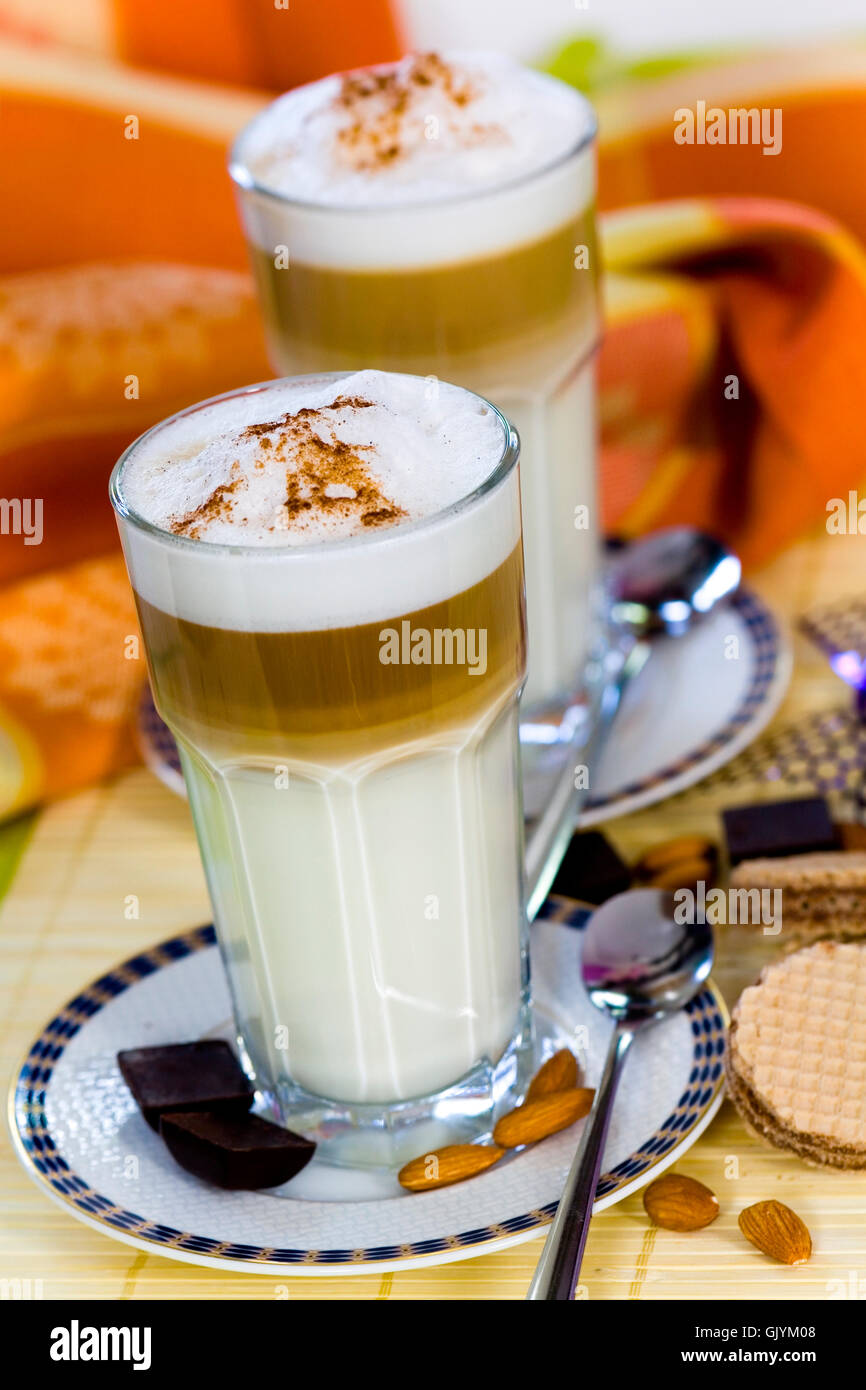 latte macchiato and sweet cookies,chocolate,almonds Stock Photo