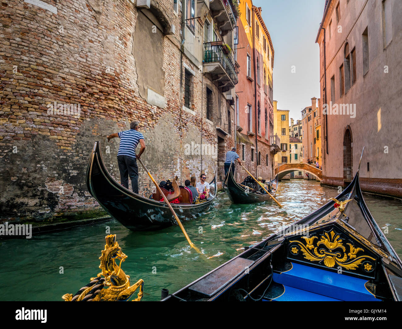 Gondolas passing on a narrow canal hi-res stock photography and images ...