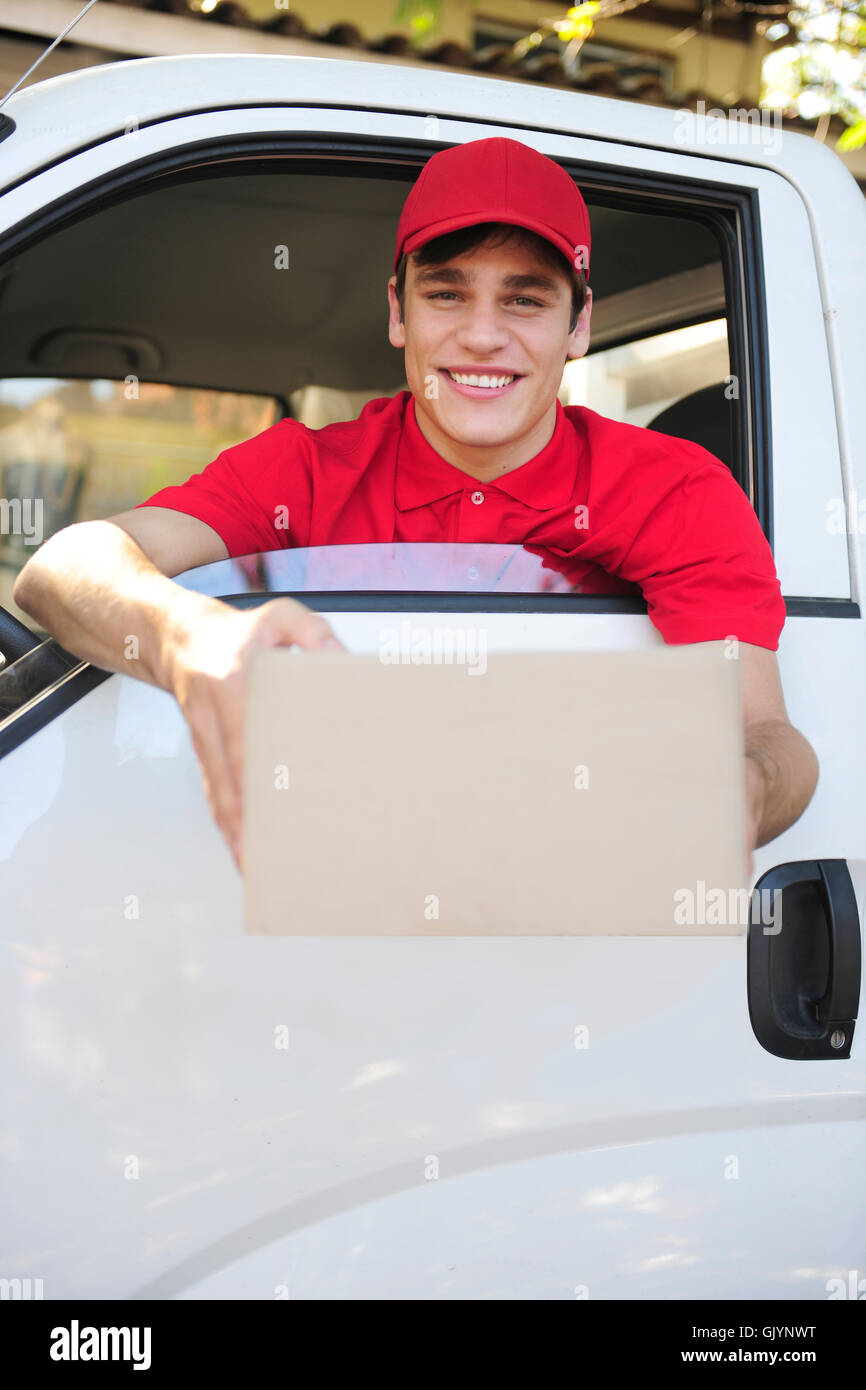 friendly parcel delivery in lieferwag Stock Photo