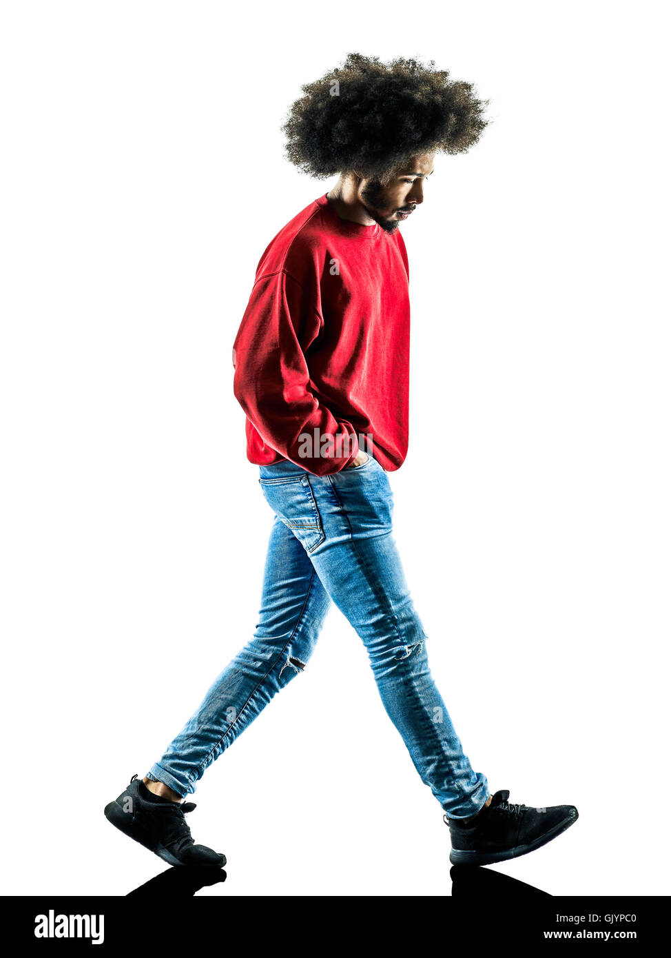 one african man  walking walker sadness in silhouette isolated on white background Stock Photo