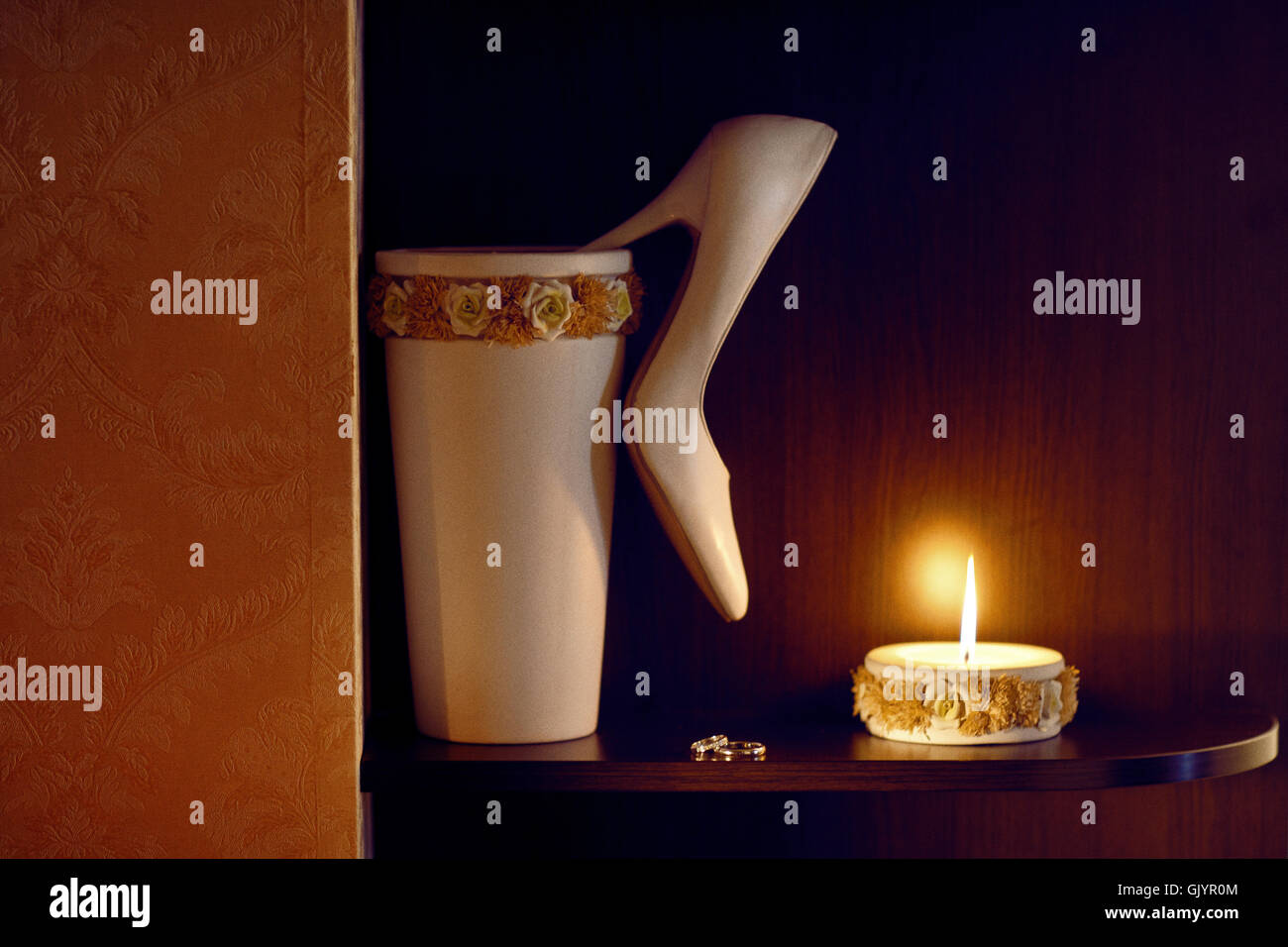 candle, shoe and rings Stock Photo Alamy