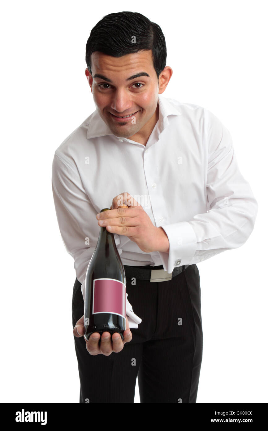 Waiter or servant presenting wine Stock Photo