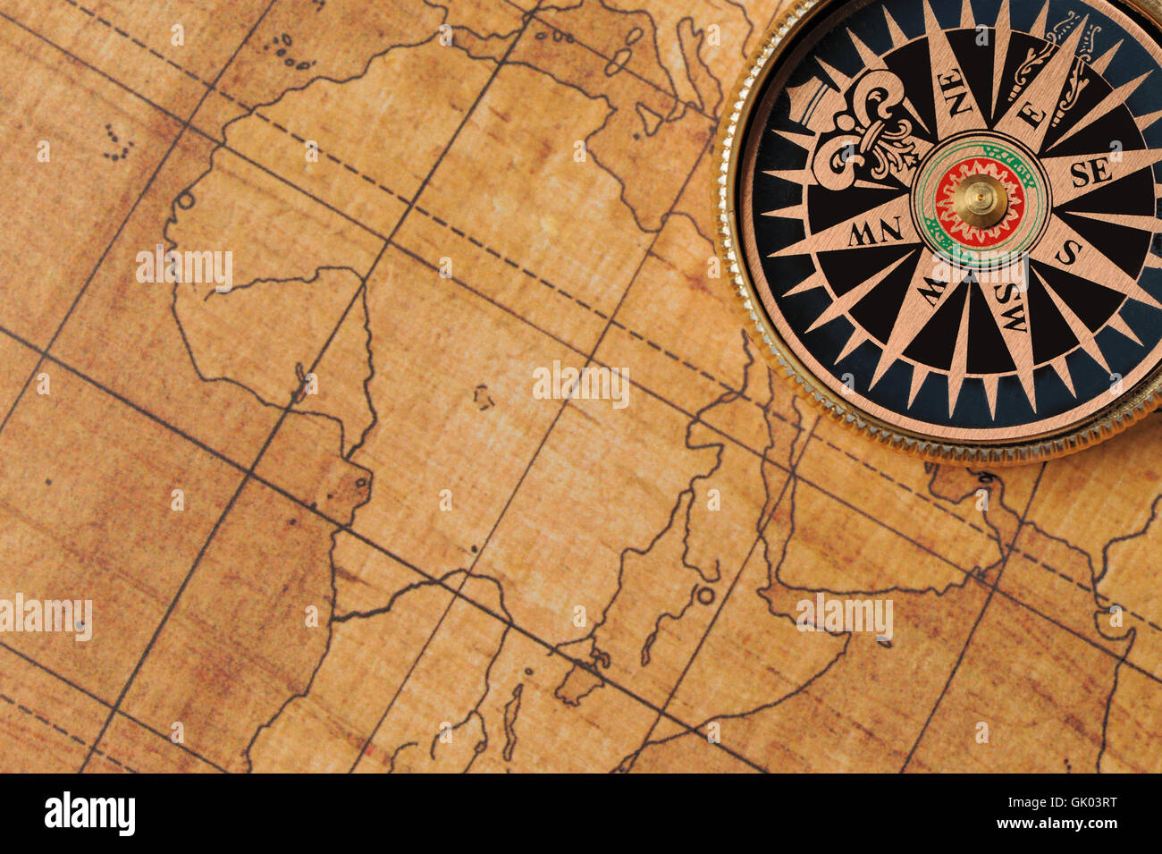 Old compass and map Stock Photo - Alamy