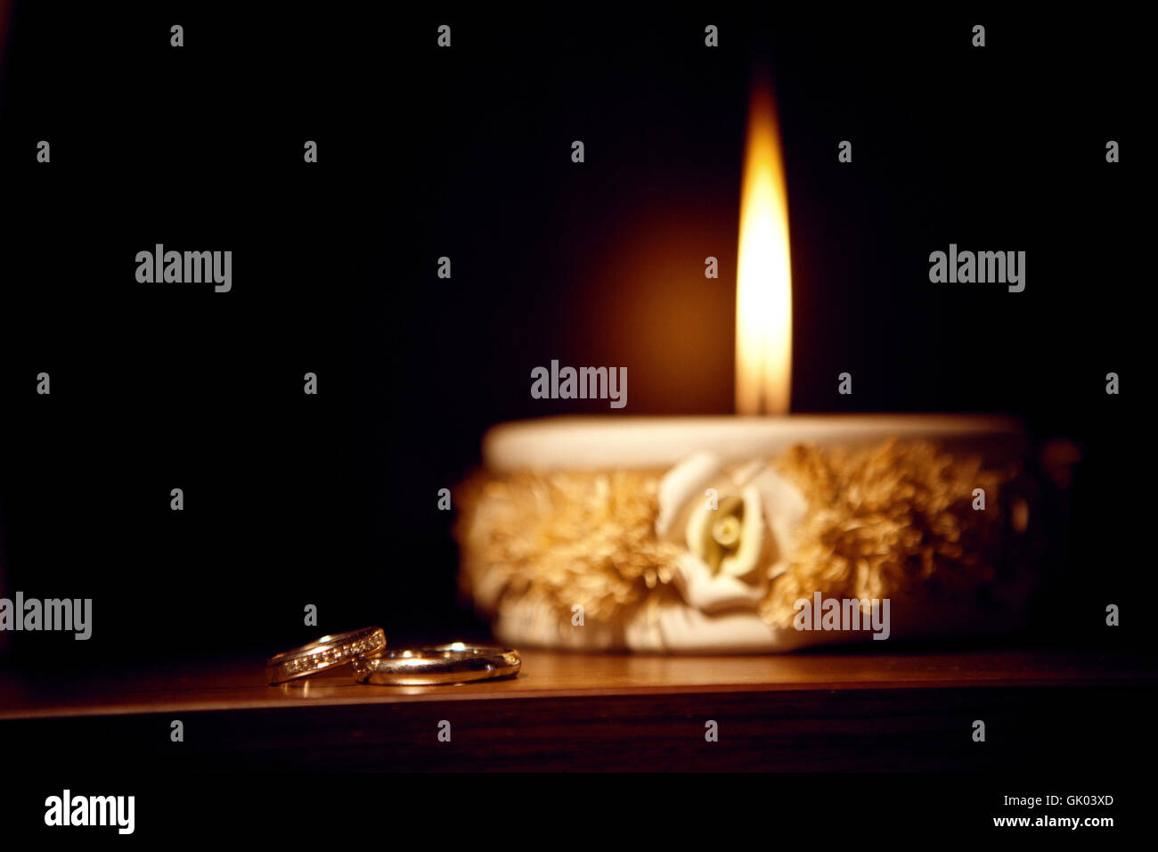 candle and rings Stock Photo - Alamy