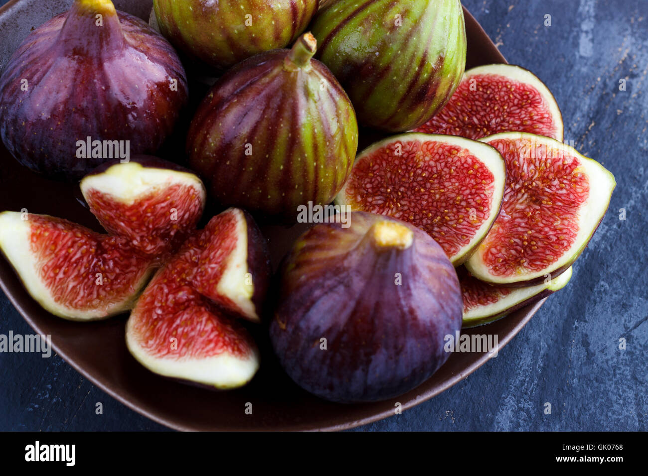 Ripe figs on dark rustic background,selective focus Stock Photo Alamy