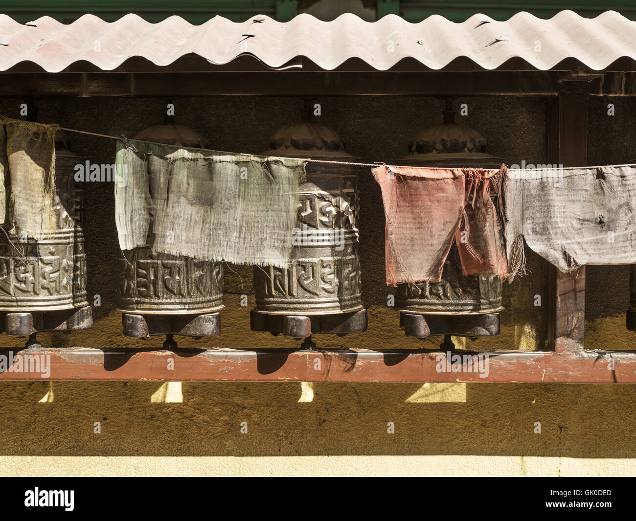 Boudhanath Stupa prayer wheels and flags Stock Photo
