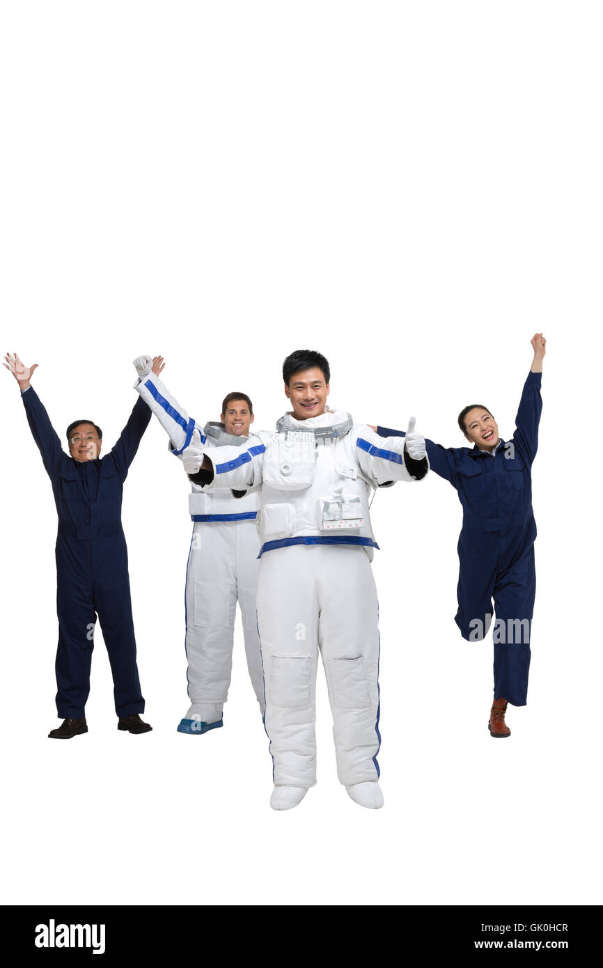 Studio shot astronauts and engineers Stock Photo