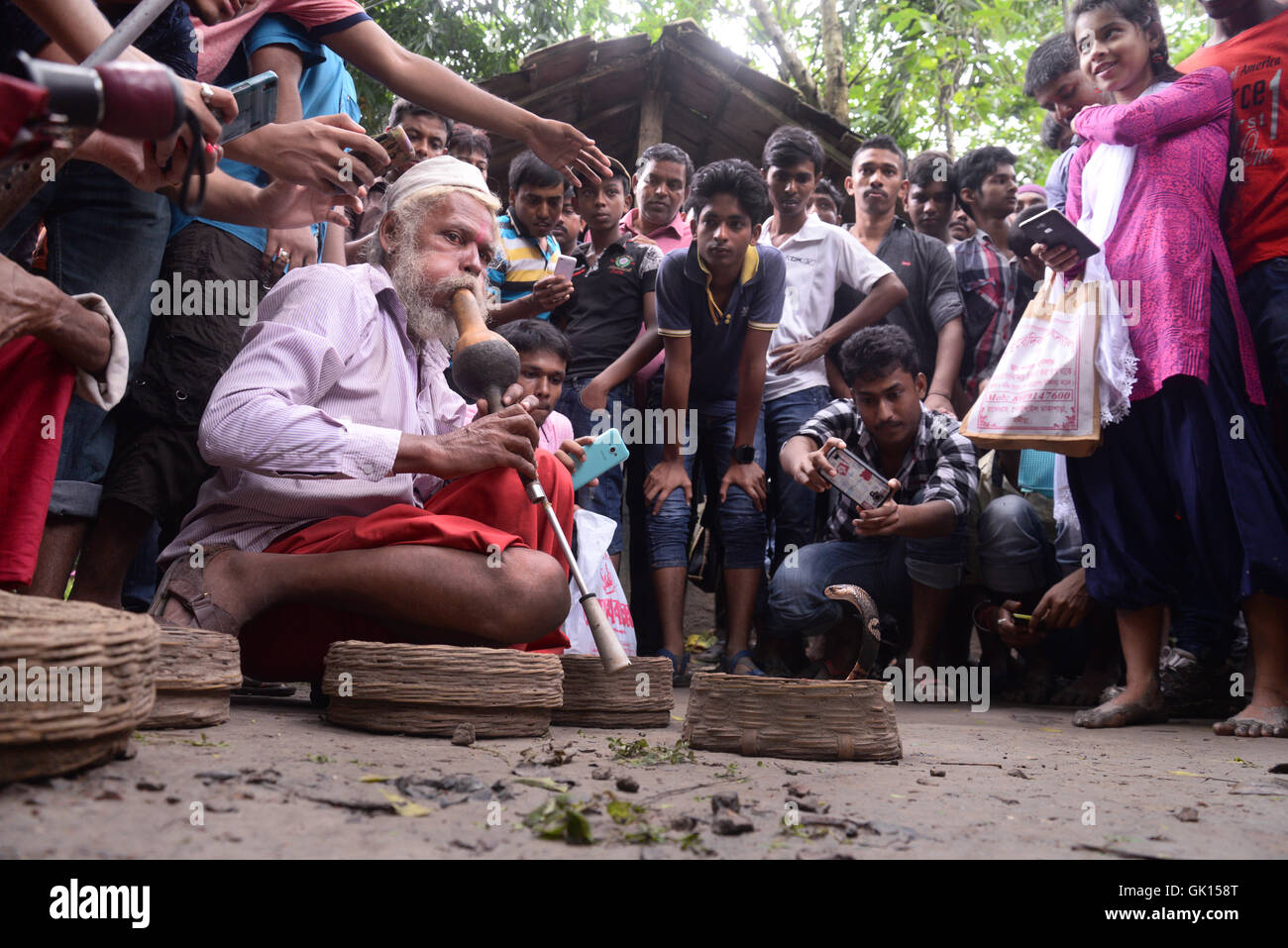 Kolkata, India. 17th Aug, 2016. Thousand of Devotees and snake charmer