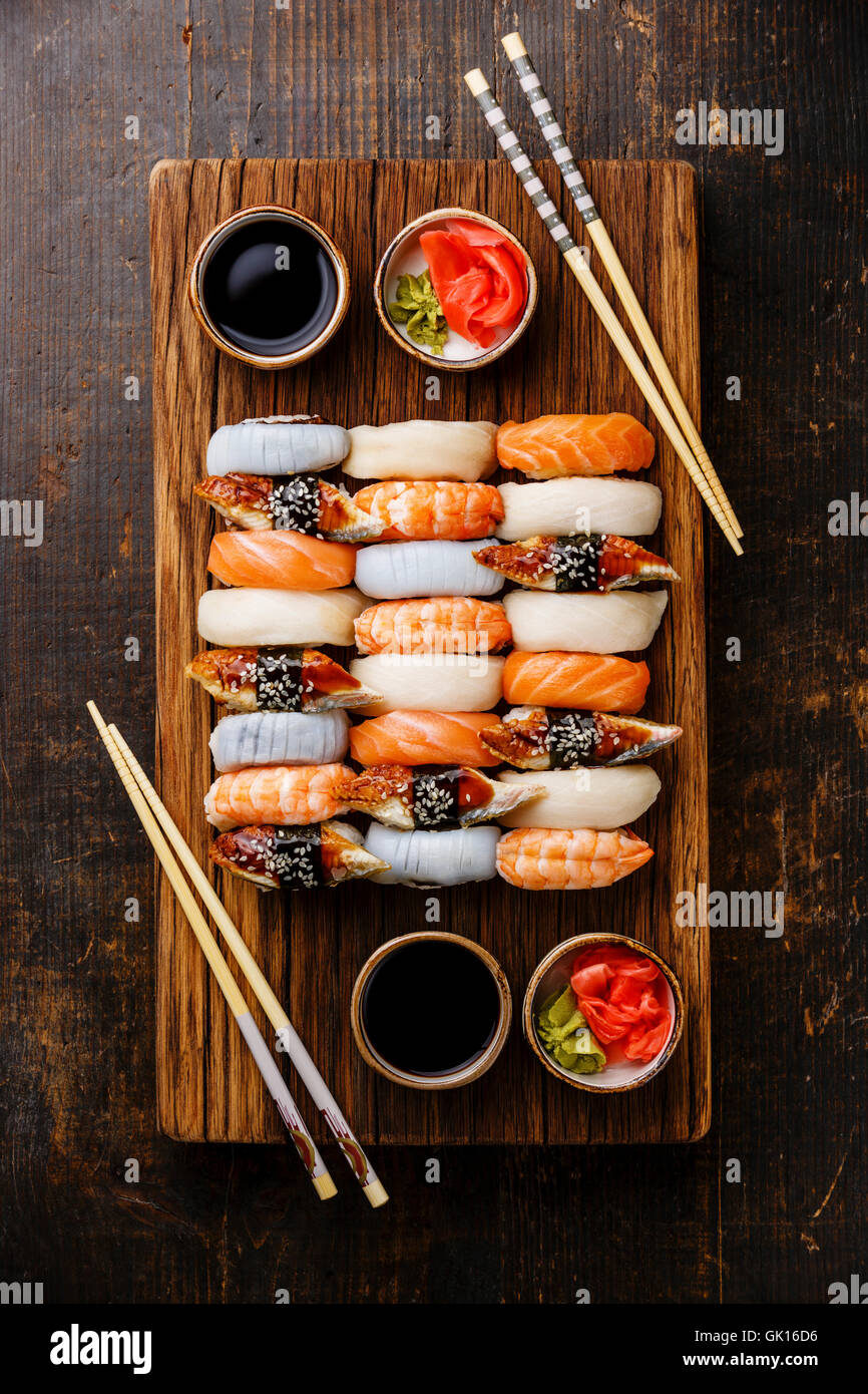 Nigiri sushi set for two on wooden serving board block Stock Photo