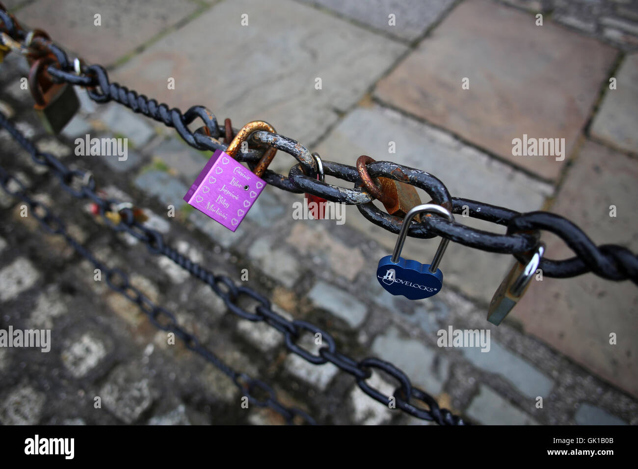 Love locks left on a chain at Albert Docks, Liverpool Stock Photo Alamy