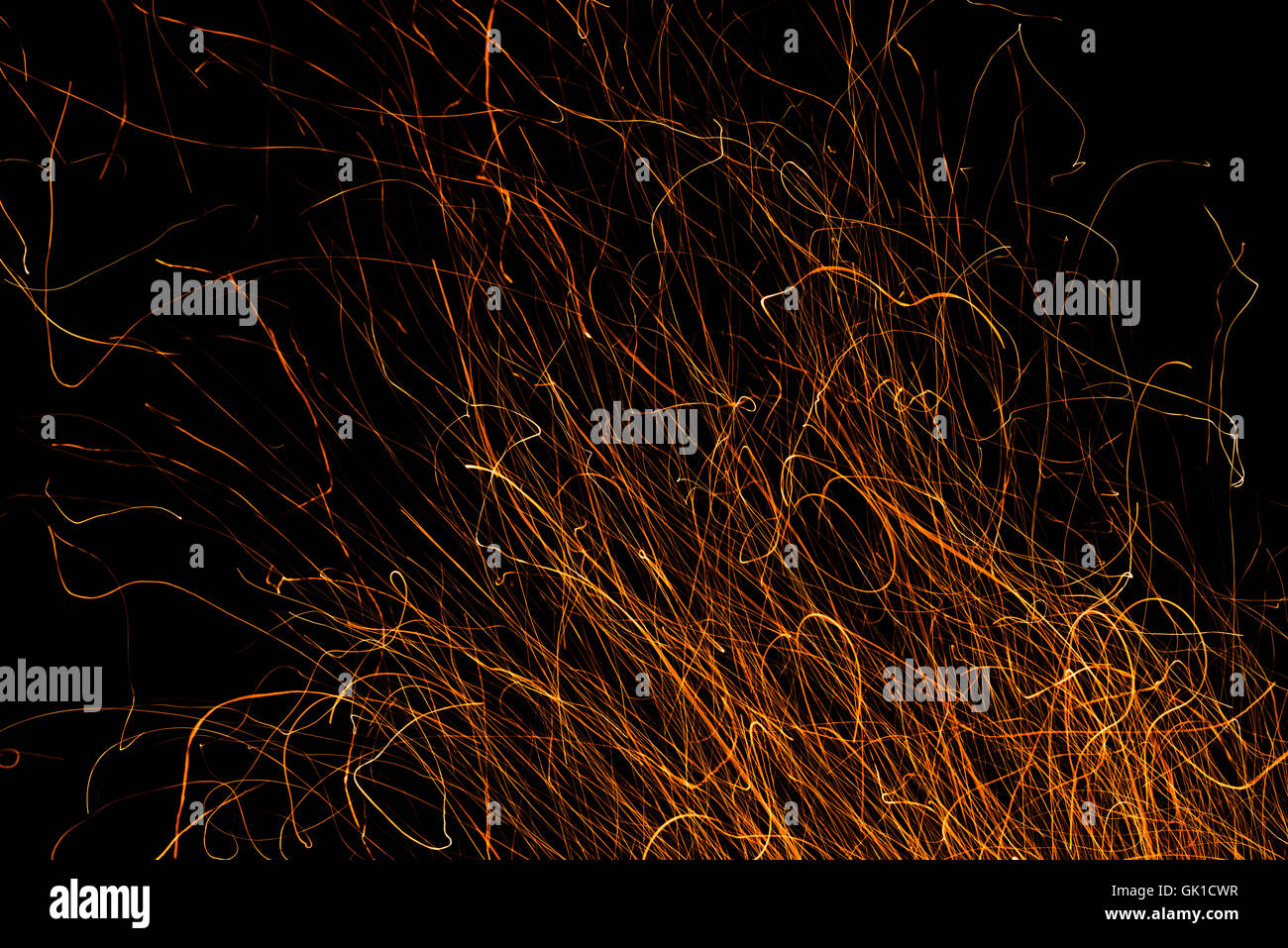 Dancing flames and sparks isolated on black Stock Photo - Alamy