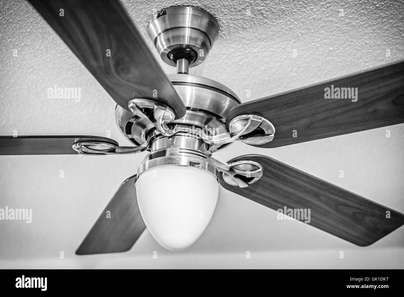 Wooden ceiling fan with light Stock Photo Alamy