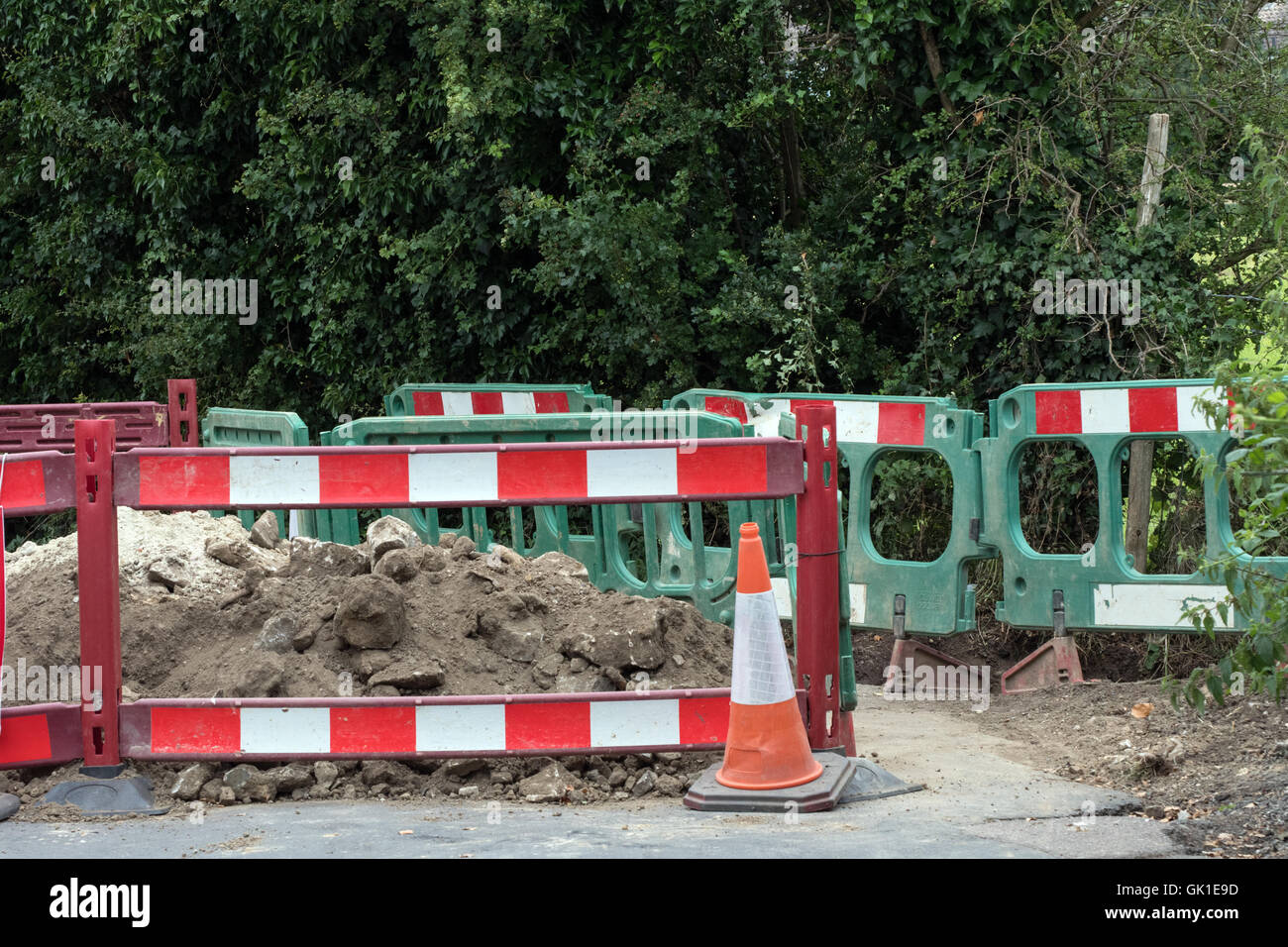 Barriers around road works Stock Photo